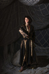 Sophisticated male party look merging contemporary suit with Arabian Nights fantasy