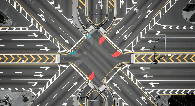 Aerial view of a complex road junction showcasing traffic flow and urban planning elegance