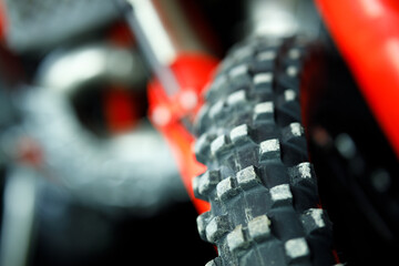 A close up of a tire with a black and white pattern