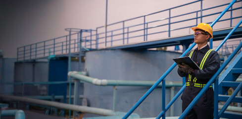 Petrochemical engineer working at petroleum oil refinery industry area. Industrial technician...
