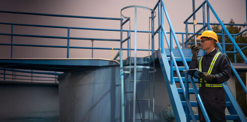 Petrochemical engineer working at petroleum oil refinery industry area. Industrial technician...