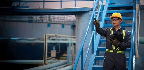 Petrochemical engineer working at petroleum oil refinery industry area. Industrial technician...