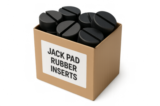 Cardboard box containing eight jack pad rubber inserts on transparent background