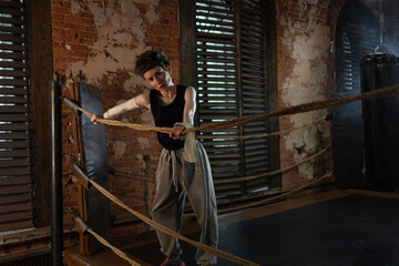 A moment of relaxation before new achievements,concept, sporting achievements, female wrestler in...