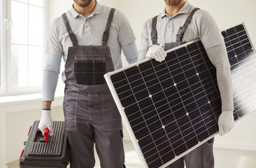 Workers team home, male group ready for office battery installations, indoors and outside...