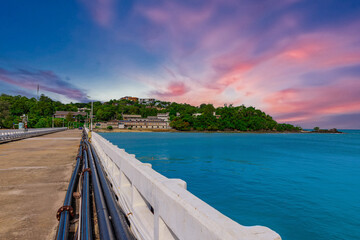 Obraz premium Beautiful view from Kao Khad next to Cape Panwa on the island of Phuket Thailand. Views of the turquoise Blue waters of the Andaman Sea and small islands off the coat of Phuket
