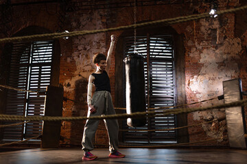 champion pose, throw your fist up, you're a winner, the mood of a motivating sports story,...