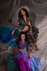 Artistic Middle Eastern group portrait showcasing women in colorful, intricately designed Arabic...