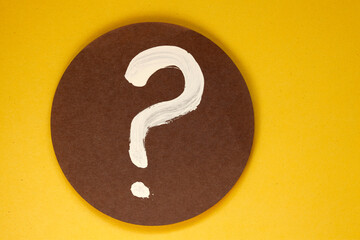 question mark painted on paper background - design template