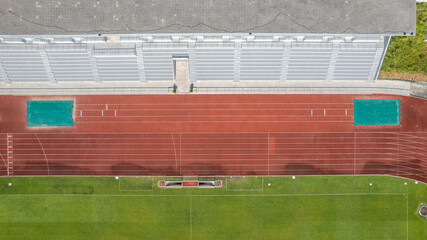 Aerial view of the Manuela Machado Municipal Stadium. Consisting of a stadium football field with synthetic turf and an athletics track with ten tracks. Long jump track.