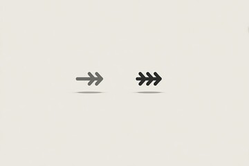 Two simple, stylized arrows pointing to the right.
