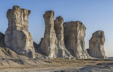 Ancient rock formations in a dry, desolate landscape
