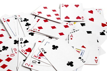 A deck of cards lies on a white background.	