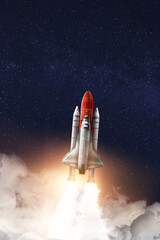 Modern space rocket in beautiful starry sky
