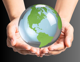Nature-Inspired Concept Human Hands Supporting a Crystal World Globe