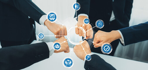 A dynamic image showcasing team collaboration through fist bumps, with technology icons...