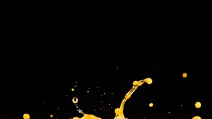 Thick mango juice splash captured in mid-explosion with suspended liquid threads under clear lighting on black backdrop - Powered by Adobe