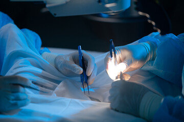 Surgeons Performing Precision Surgery Under Bright Operating Room Lights
