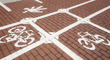 Designated pathways for pedestrian and bicycle traffic on brick road surface intersection