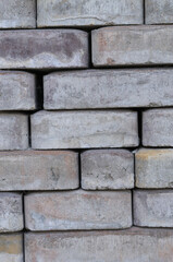 Background of gray brick wall texture. Building material for background and texture.