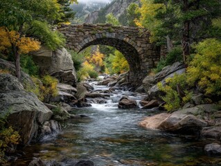 Stone arch bridge over a flowing river in a lush green forest. Serene autumn scene.