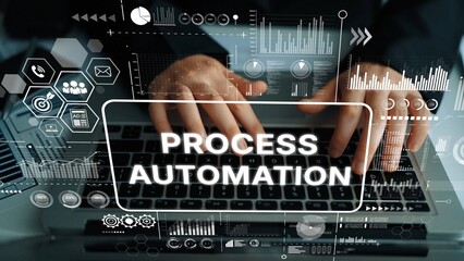 Hands Typing on Laptop with Overlay of Process Automation Graphics and Data Visualizations....