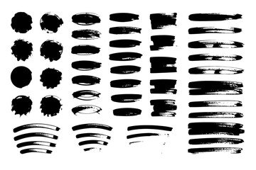 A collection of black brush strokes, circles, and paint splatters on white isolated on transparent background
