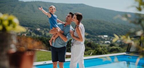Joyful family moment in backyard with child