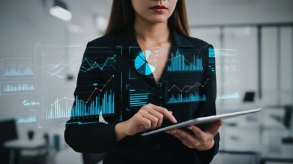 Businesswoman utilizes innovative digital technology for data analysis, interacting with futuristic holographic graphs and charts in a modern office, showcasing the future of business intelligence. - Powered by Adobe