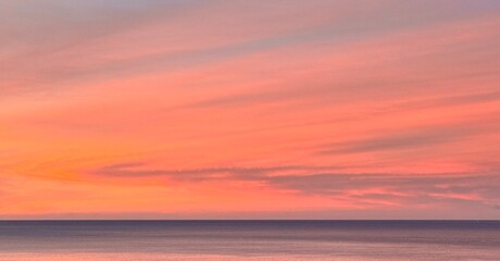 Pastel pink sunset over calm Cabo ocean horizon – Coastal Escape Series