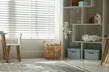 Stylish playroom with decor and furniture. Interior design