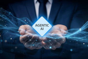 Businessman Holding Glowing "AGENTIC AI" Cube with Digital Energy in Futuristic Corporate Setting