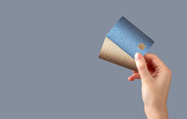 Finger holding bankcard with chip. Payment, cashback, credit, salary transfer, commerce, income,