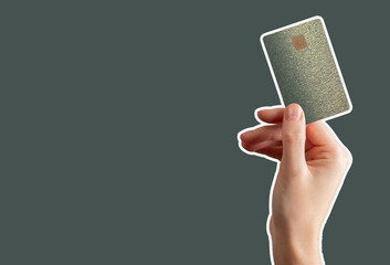 Hand grasping card with chip symbolizes reliable cashless payments, salary deposits, and credit fund