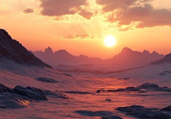 Sunset over a desolate, snowy mountain range