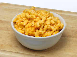 Bowl of Macaroni and Cheese on Cutting Board