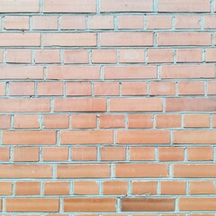 Red brick wall - blank background for presentations and advertising.