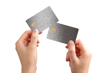 Two bankcards held in hand. Woman showing debit and credit cards with chip for secure payment,