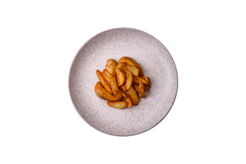 Grilled potato wedges with rosemary, cheese, salt and spices. Baked potato slices