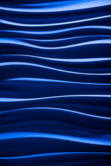 Wall panel detail of blue wavey lines