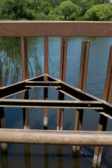 A rusted part of the lifting mechanism of an old dam	