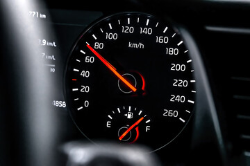 Fototapeta premium Car screen dashboard with eighty km on speedometer indicator.Intelligent driver digital information panel system in modern luxury automobile.Safe driving concept.