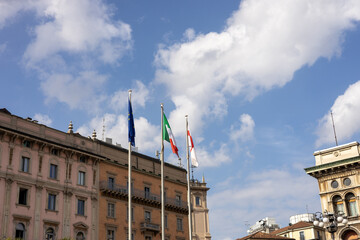 Italian and European union flags in Milan, Italy.