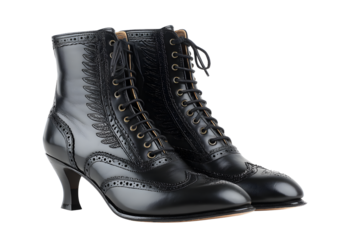 A pair of black leather ankle boots on a transparent background