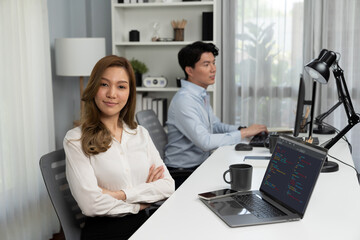Profile smiling beautiful Asian businesswoman looking camera to portrait pose at modern office on...