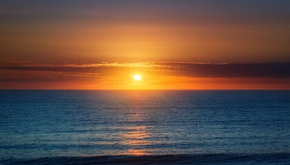 magnificence of a sunrise on horizon with its ethereal hues boundless oceanic expanse and profound intermingling of earth and sky