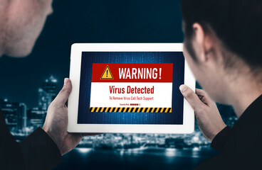 Virus warning alert on computer screen detected modish cyber threat , hacker, computer virus and...