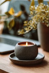 Ceramic Candle Holder with Flowers and Laptop in Background – Warm Scented Decor for Modern Workspace