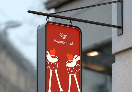 Vertical Storefront Sign Mockup on Urban Wall