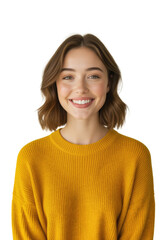 A young woman with brown hair and a warm smile gazes directly at the camera, wearing a mustard yellow sweater against a soft gray background.